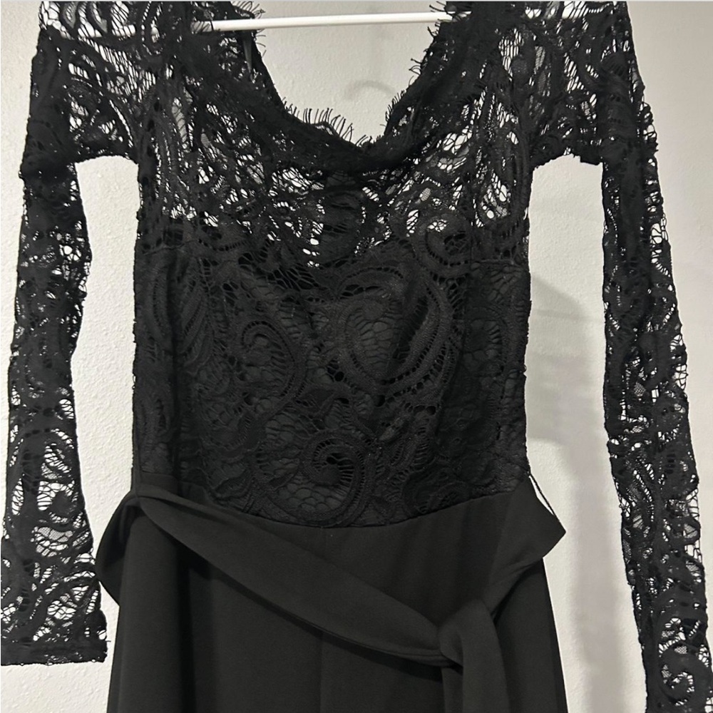 Premier Armour black jumpsuit with lace top and sleeves, tie around waist